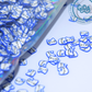 Blue hello Kitty Polymer clay 1 oz